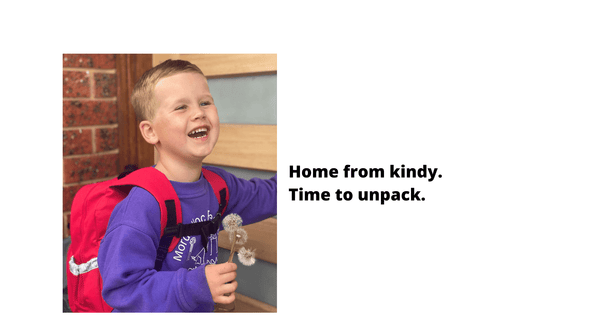 Boy wearing a jude&moo backpack ready to unpack it after kindergarten.